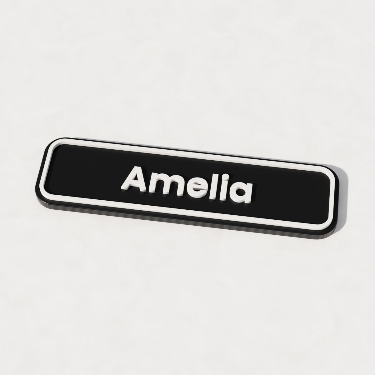 Personalised Buddy NameTag in black with raised white name and border