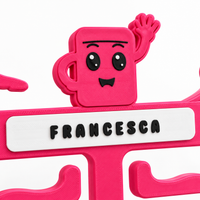 Close-up of the waving Buddy character and personalised FRANCESCA nameplate